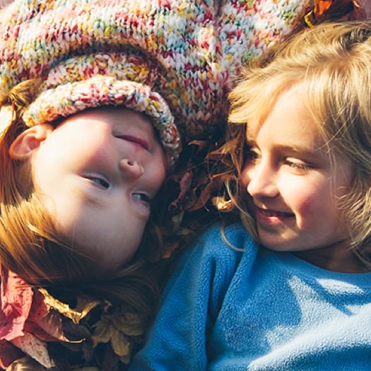 Two children looking at each other